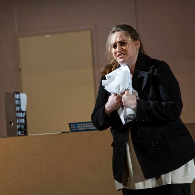 On stage as Magda Sorel in The Consul by Giancarlo Menotti. Here is Katariina Heikkilä in the role of the secretary. In Helsinki Finland - November 2012